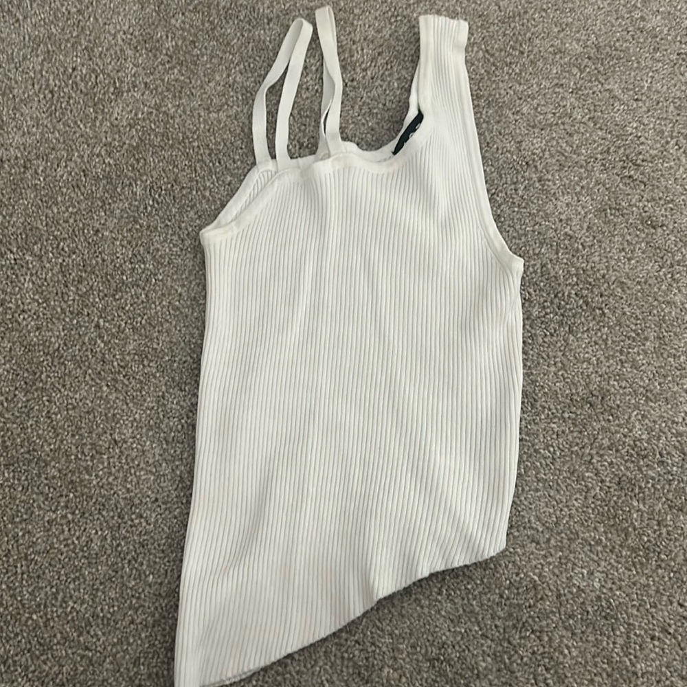 White a-symmetrical top